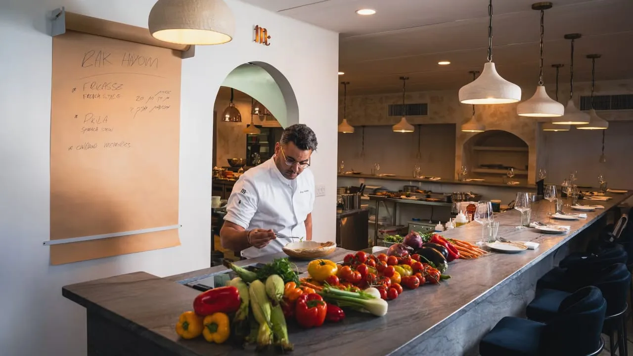 Chef preparing food for a NOSH program